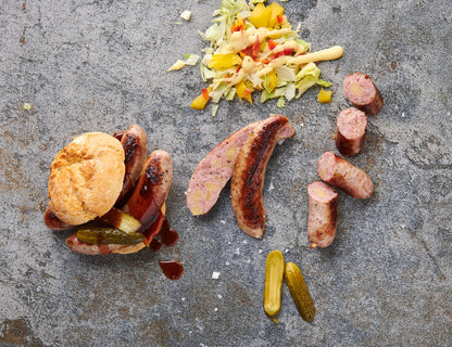 Gegrillte Grumbeer Griller mit Brötchen und Kartoffeln