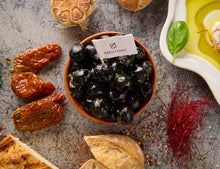 Schwarze Oliven mit Knoblauch 150g