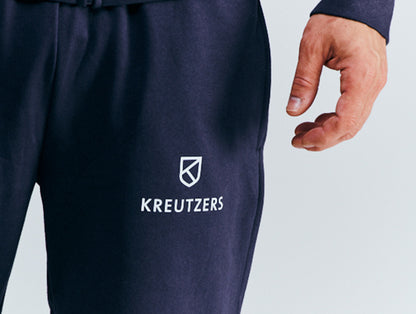 Die Schmiede – Pánské tepláky KREUTZERS Basic (námořnická modrá)