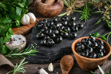 Schwarze Oliven mit Knoblauch 150g