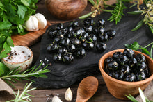 Schwarze Oliven mit Knoblauch 150g